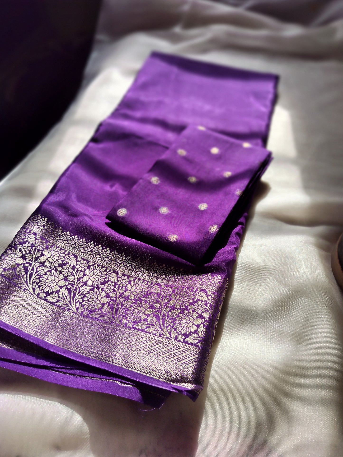 "premium designer saree -body hugging and flowy drape