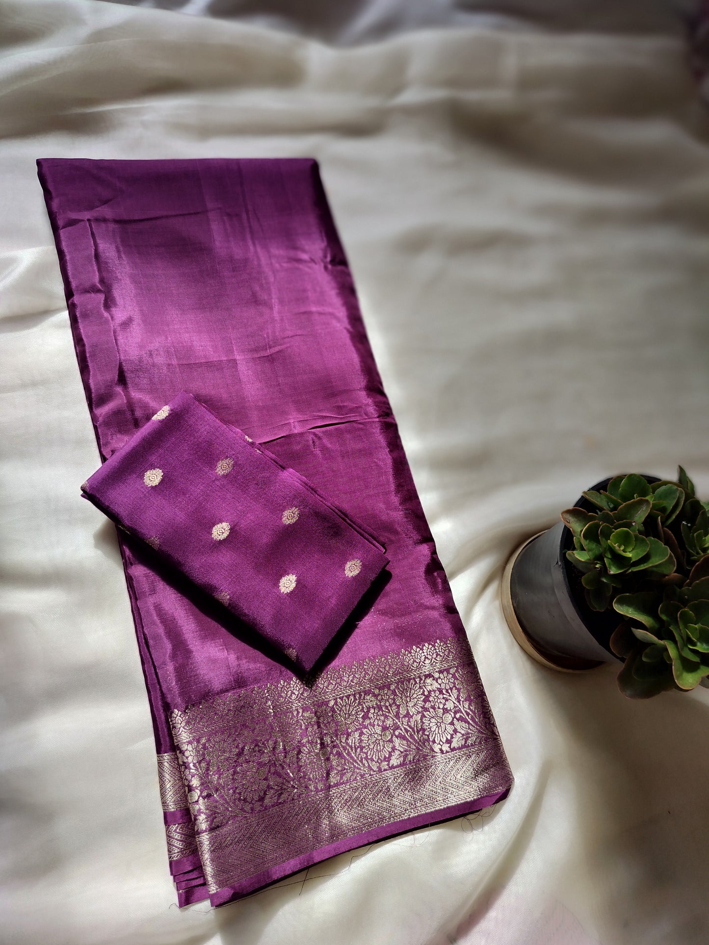 "premium designer saree -body hugging and flowy drape