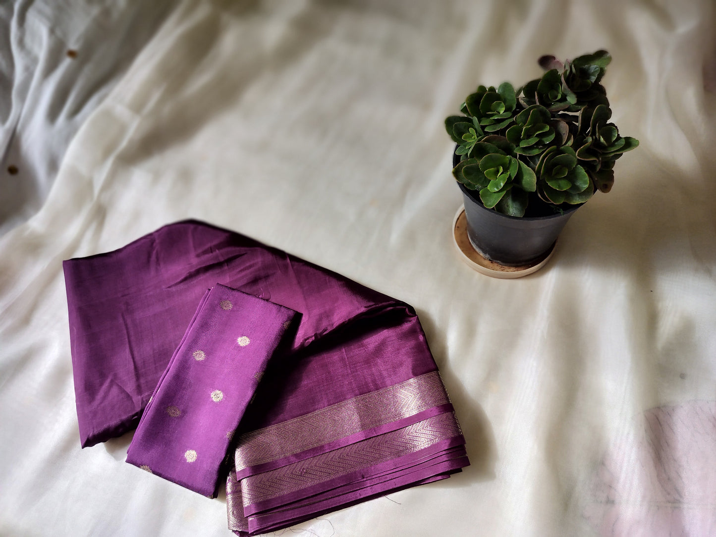 "premium designer saree -body hugging and flowy drape